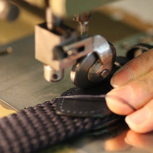 Farnese sewing a belt