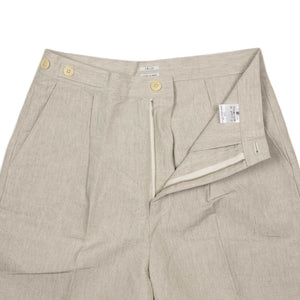 Relaxed pleated trousers in ivory paper and linen