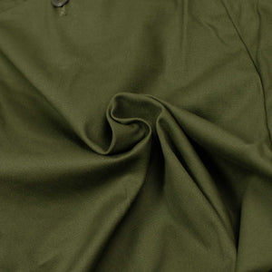 Pleated ghurka-style shorts in olive green cotton twill