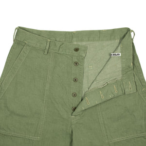 Baker pants in green cotton denim