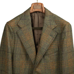 x Sartoria Carrara: Sport coat in moss green Fox Tweed with amber check