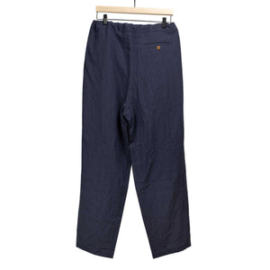 Pleated drawstring trousers in navy and blue striped cotton/linen