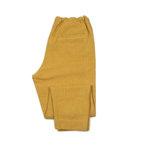 Drawstring tapered trousers in mango yellow cotton basketweave