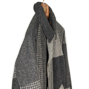 Balmacaan coat in Harris Tweed black and grey wool patchwork