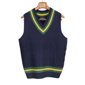 Cricket vest in navy patchwork wool with yellow and green stripe