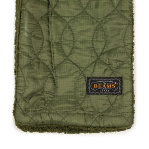 Double-faced scarf in olive boa and quilted polyester