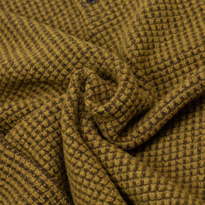 Crochet-style knit polo in brown and mustard wool