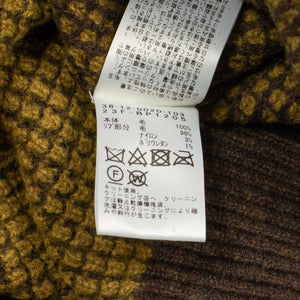Crochet-style knit polo in brown and mustard wool