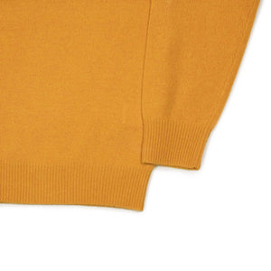 Knit polo in gold wool