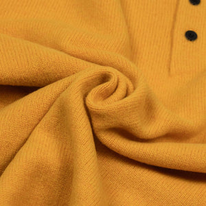 Knit polo in gold wool
