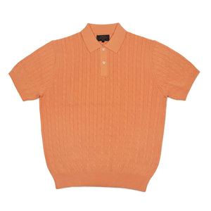 Short sleeve cable knit polo in pale orange linen and cotton