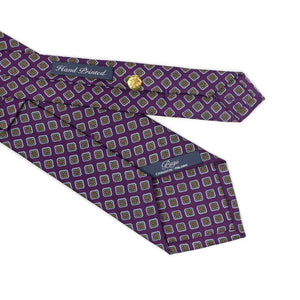 Purple silk tie, green and orange neat print