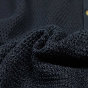 Honeycomb knit polo shirt in navy blue organic cotton