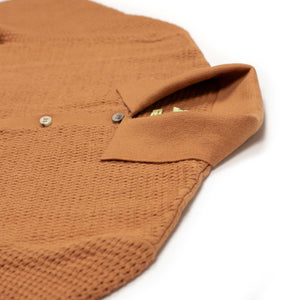 Honeycomb knit polo shirt in sienna organic cotton