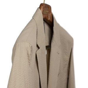 Single breasted jacket in beige cotton seersucker