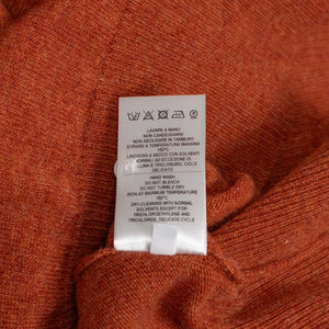Aaric classic polo sweater in orange wool mix