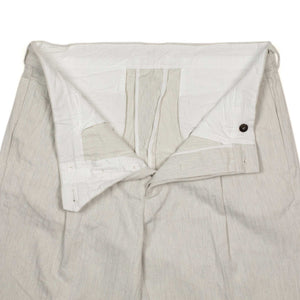Aantioco pleated trousers in bleached natural cotton herringbone