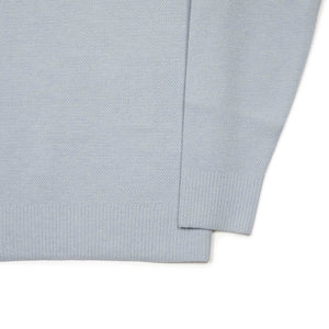 Molded knit long sleeve polo in micro-honeycomb light blue melange wool