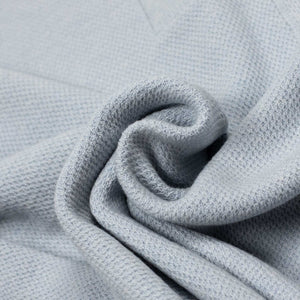 Molded knit long sleeve polo in micro-honeycomb light blue melange wool