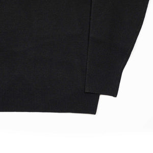 Molded knit long sleeve polo in micro-honeycomb black melange wool