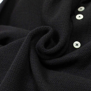 Molded knit long sleeve polo in micro-honeycomb black melange wool