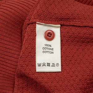 Knit short sleeve polo in brick red mini diamond pattern cotton