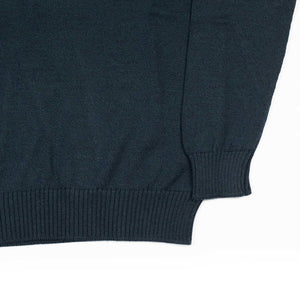 Rollneck sweater in petrol superfine merino wool