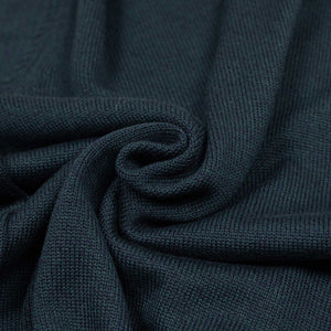 Rollneck sweater in petrol superfine merino wool