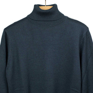 Rollneck sweater in petrol superfine merino wool