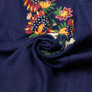 Luis shirt in indigo blue handwoven cotton with hand-embroidered flowers