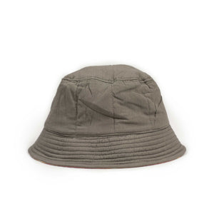 Quilted reversible bucket hat in red, grey and ochre Ikat cotton