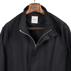Sage de Cret SS26 Stand collar work jacket in black cotton and Sage de Cret SS26 Stand collar work jacket in black cotton and