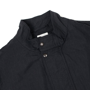 Sage de Cret SS26 Stand collar work jacket in black cotton and Sage de Cret SS26 Stand collar work jacket in black cotton and
