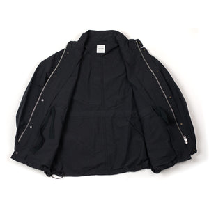 Sage de Cret SS26 Stand collar work jacket in black cotton and