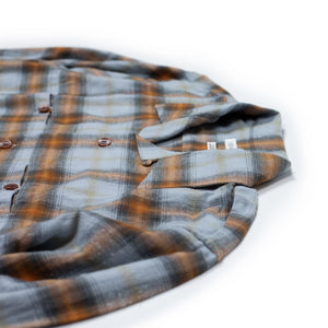 Seuvas FW25 Open collar shirt in saxe blue and orange plaid neppy