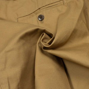 Pleated ghurka-style shorts in beige cotton twill