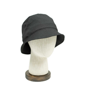 Storage loop bucket hat in tonal black CoolMax seersucker