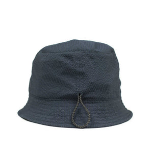 Storage loop bucket hat in tonal navy blue CoolMax seersucker