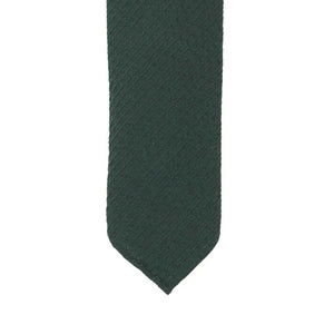 Solid tie in dark green wool seersucker