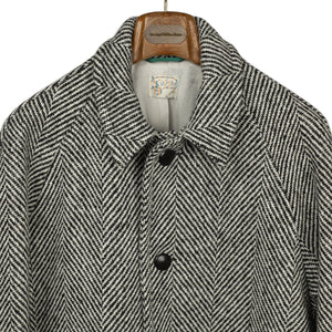 Wythe FW25 Balmacaan coat in black and white herringbone wool