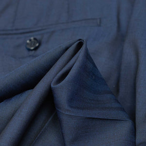 Pleated Lounge trousers in navy herringbone wool Solaro