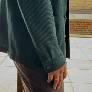 x Sartoria Carrara: chore jacket in dark green wool "seersucker"