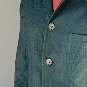 x Sartoria Carrara: chore jacket in dark green wool "seersucker"