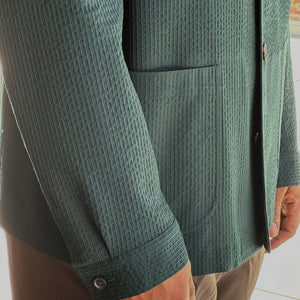 x Sartoria Carrara: chore jacket in dark green wool "seersucker"