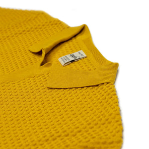 Bubble-knit short sleeve polo shirt in goldenrod cotton (restock)