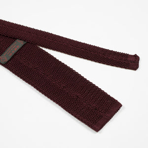 Burgundy square bottom silk knit tie, hand-sewn grey dots