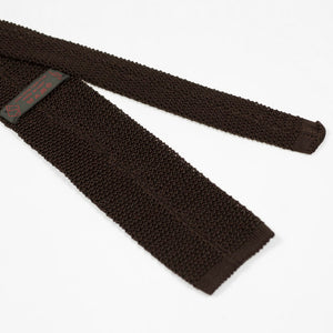 Brown square bottom silk knit tie, hand-sewn rust dots