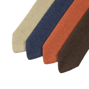 Coral pointed bottom cotton knit tie