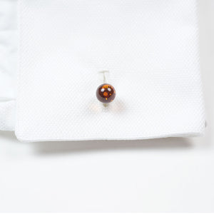 Silver cufflinks with genuine amber spheres