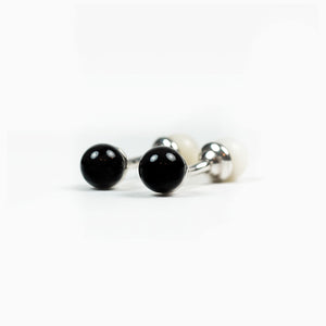 Reversible silver cufflinks, onyx and natural mother-of-pearl spheres